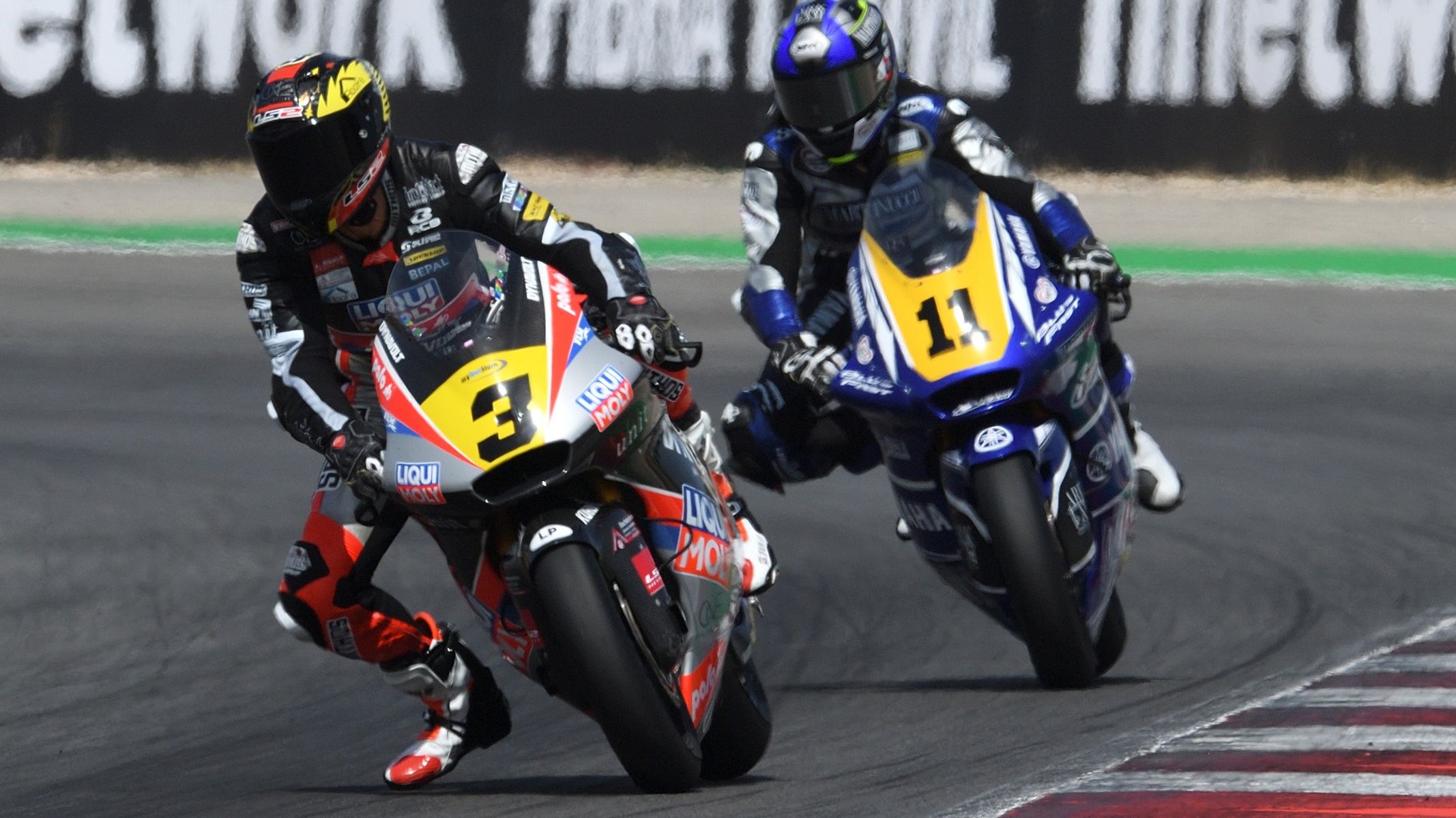 Lukas Tulovic y Álex Escrig se llevaron las victorias de Moto2 en Portimao