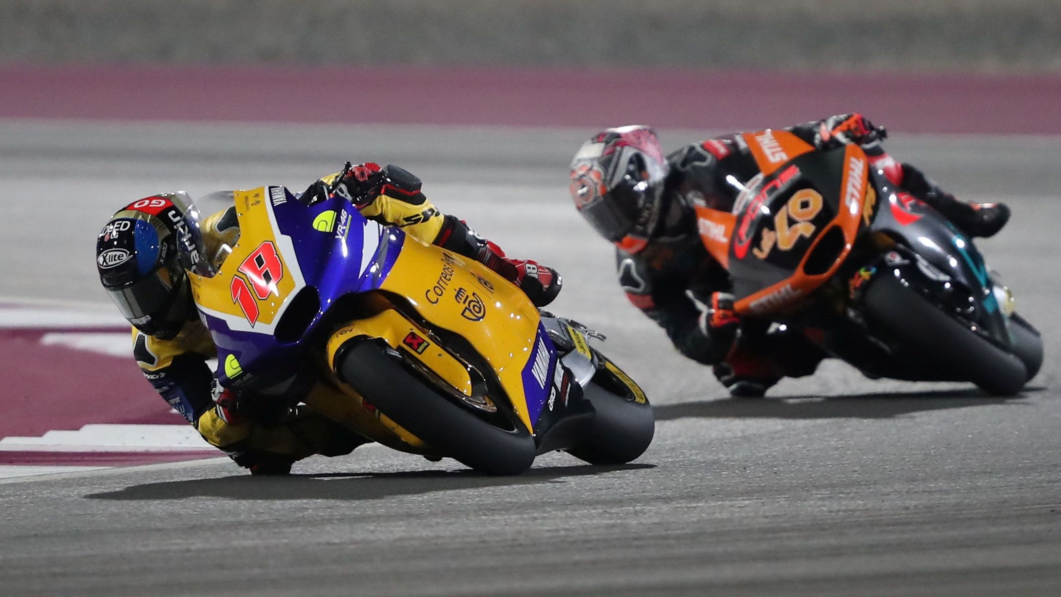 Manu González delante de Arón Canet, Moto2 Qatar 2023