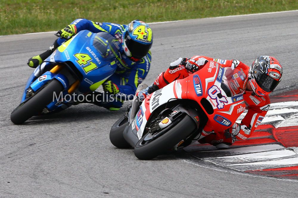 Dovizioso y Aleix Espargaró. Sepang 2015. Día 1. Foto: Motociclismo.es