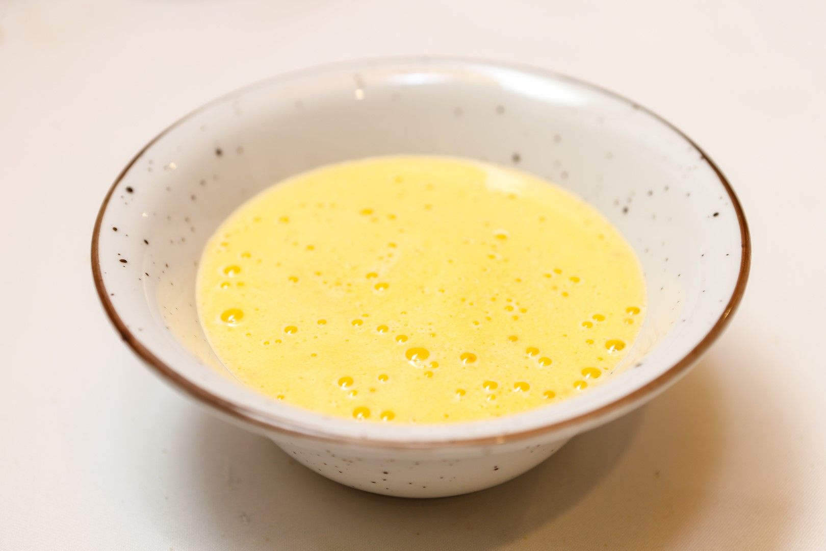 La Gastrocasa: Espuma de yema con fruta de la pasión, turrón y jengibre.