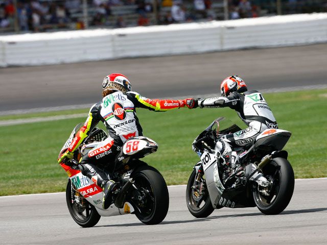 Hiroshi Aoyama y Marco Simoncelli se juegan el título de 250 cc