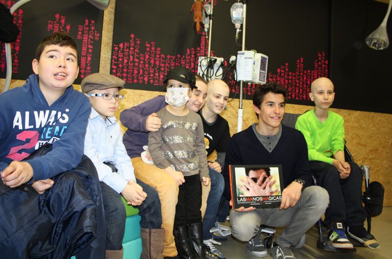 Márquez y Lorenzo, campeones solidarios