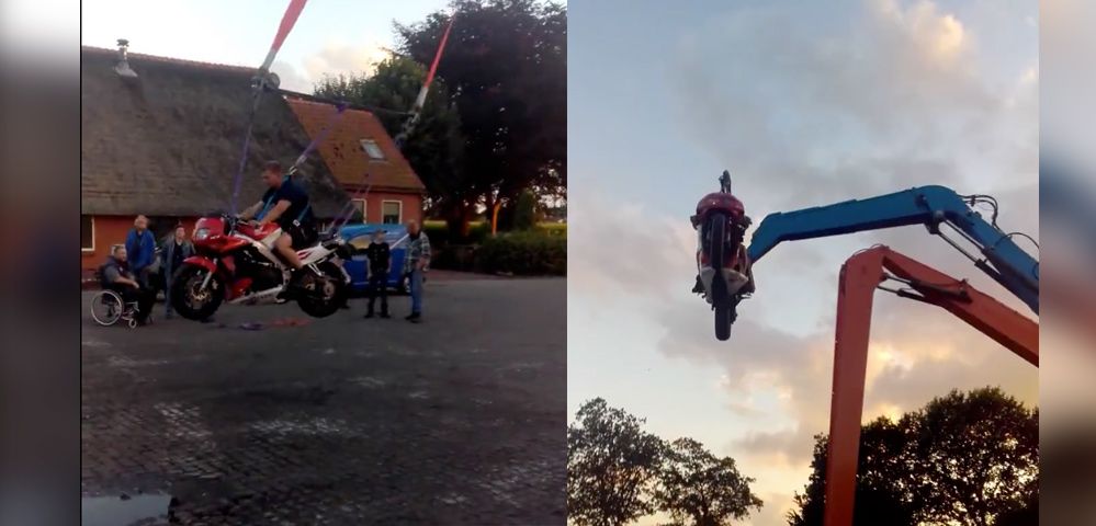 Una grúa + una moto = el mejor columpio para adultos