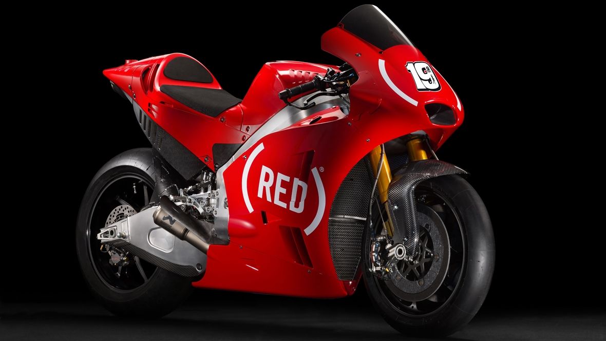 Las Aprilia de MotoGP correrán de rojo en Cheste para luchar contra el SIDA