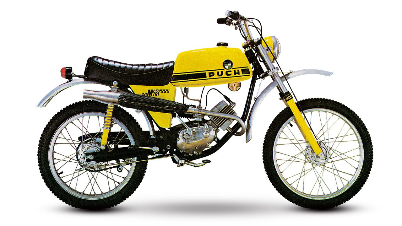 Puch Minicross 50 1972-1983. Motor: 2 tiempos, un cilindro vertical, 49 cc, 4/9 CV a 6.000 rpm. Chasis: Simple cuna de acero, basculante monobrazo. Peso: 55 kg.