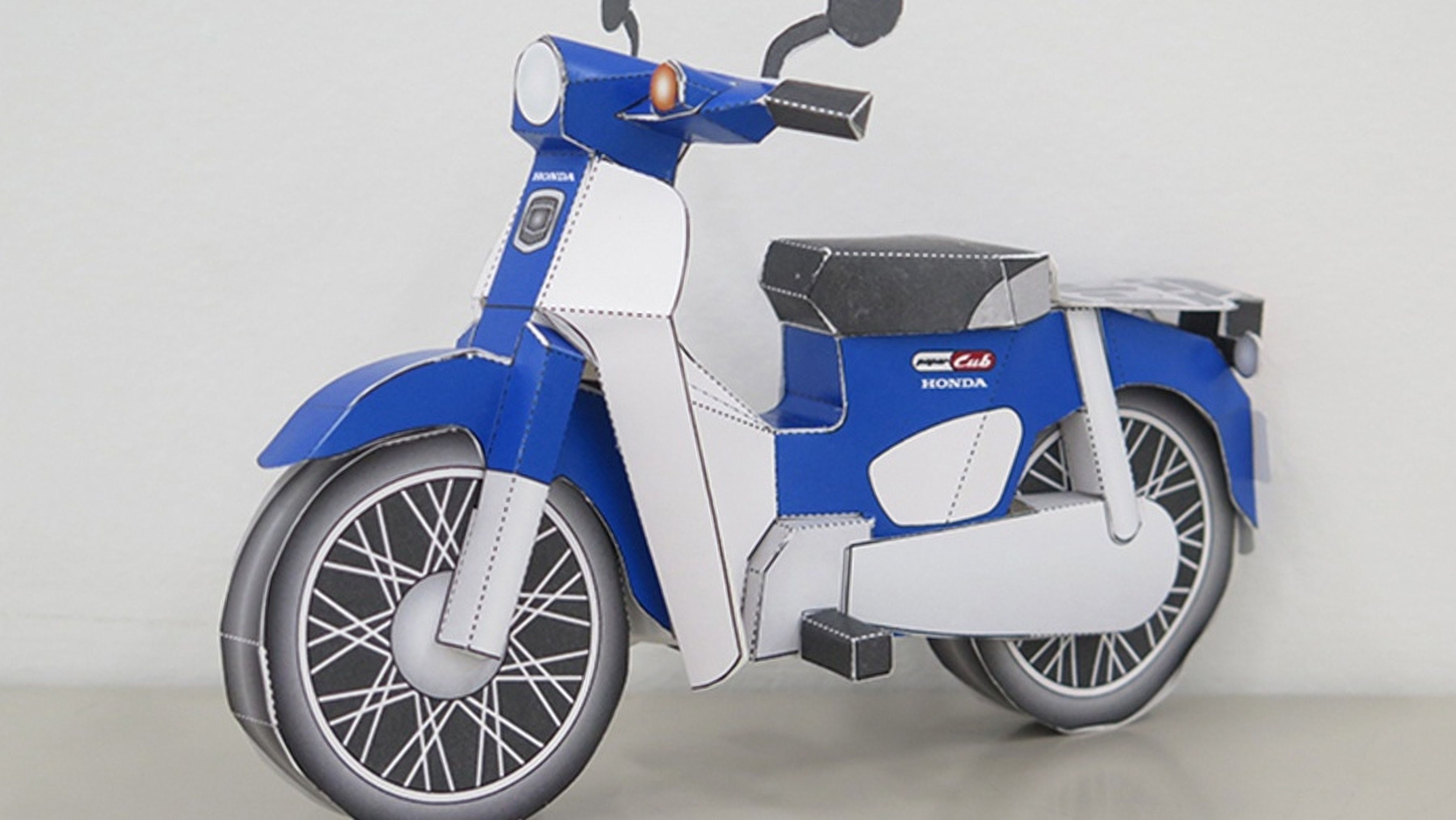 Honda Super Cub azul de papiroflexia